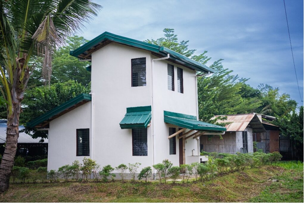 Two-storey model unit in Panabo, Davao, a joint project of BASE and AOF Foundation for the banana farmers