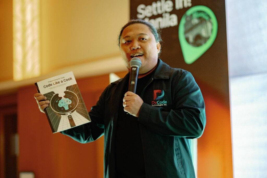Eliezer Rabadon, CEO of DVCode, introduces Code Like a Cook, an educational book on blockchain technology that uses cooking-based analogies